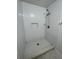 Tiled shower space with built in soap and shampoo nook, and a rainfall shower head and handheld sprayer attachment at 4372 Middlebrook Rd # 3, Orlando, FL 32811