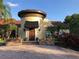 Beautiful home exterior with a charming front facade, a brick driveway and landscaping at 5116 Conroy Rd # 411, Orlando, FL 32811