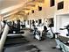 Bright and spacious gym featuring modern cardio equipment and plenty of natural light at 5116 Conroy Rd # 411, Orlando, FL 32811
