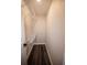 Walk-in closet with wire shelving and dark wood-look flooring at 5118 Log Wagon Rd, Ocoee, FL 34761