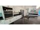 Close up of a well-appointed kitchen with stainless steel appliances and a large island with a sink at 5118 Log Wagon Rd, Ocoee, FL 34761
