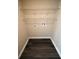 Interior view of a laundry room with wire shelving and plumbing fixtures at 5118 Log Wagon Rd, Ocoee, FL 34761