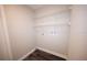 Laundry room with storage shelving and laundry hookups at 5118 Log Wagon Rd, Ocoee, FL 34761