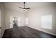 Spacious main bedroom featuring high ceilings, neutral paint, and ample natural light at 5118 Log Wagon Rd, Ocoee, FL 34761