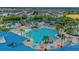 Community featuring an amazing pool area, lazy river, splash pad, and more! at 720 Gardenia Ln, Davenport, FL 33897
