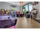 Resort gaming zone with a variety of arcade games and air hockey for Gathering fun at 720 Gardenia Ln, Davenport, FL 33897