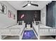 Chic bedroom featuring themed accents, contemporary decor, and ample natural light at 720 Gardenia Ln, Davenport, FL 33897