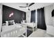 Stylish bedroom with unique themed decor, modern lighting, and comfortable beds at 720 Gardenia Ln, Davenport, FL 33897