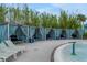 Poolside cabanas line the edge of the waterpark, offering a private retreat at 720 Gardenia Ln, Davenport, FL 33897