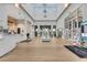 Bright and spacious Windsor Island Resort lobby with high ceilings, tile floors and modern decor at 720 Gardenia Ln, Davenport, FL 33897