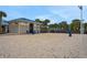 Volleyball court adjacent to the bathroom area, ideal for outdoor recreation at 720 Gardenia Ln, Davenport, FL 33897