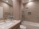 Modern bathroom featuring stylish vanity and shower-tub combo at 7461 Bleecker Ln, Kissimmee, FL 34747