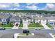 Beautiful neighborhood with well-maintained lawns and diverse home styles beneath a clear sky, providing a serene living environment at 7639 Agrigento St, Clermont, FL 34714