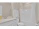 The bathroom features a vanity, toilet, and bathtub with shower curtain at 7639 Agrigento St, Clermont, FL 34714