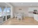 Open dining area with view to outdoor patio at 7639 Agrigento St, Clermont, FL 34714