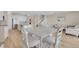 Bright dining area flows into the kitchen, perfect for entertaining at 7639 Agrigento St, Clermont, FL 34714