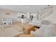 Open concept living area connecting kitchen, dining, and living room at 7639 Agrigento St, Clermont, FL 34714