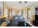 Open concept living room with a view of the dining and kitchen area at 7660 Comrow St # 203, Kissimmee, FL 34747