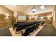 A fully-equipped theater room with comfortable seating and state-of-the-art audio-visual equipment at 7660 Comrow St # 203, Kissimmee, FL 34747