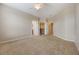 Spacious carpeted bedroom with neutral paint and ceiling fan at 8168 Boat Hook Loop # 201/718, Windermere, FL 34786