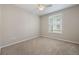 Bedroom featuring a window, a ceiling fan, plush carpeting, and neutral paint at 8168 Boat Hook Loop # 201/718, Windermere, FL 34786