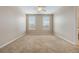 Spacious carpeted bedroom with neutral paint and ceiling fan at 8168 Boat Hook Loop # 201/718, Windermere, FL 34786