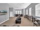 Bright community room with comfortable seating and tables at 8168 Boat Hook Loop # 201/718, Windermere, FL 34786