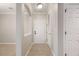 Welcoming entryway with tiled floor, neutral wall paint, and white interior doors at 8168 Boat Hook Loop # 201/718, Windermere, FL 34786
