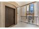 Hallway with a view of exterior at 8168 Boat Hook Loop # 201/718, Windermere, FL 34786