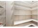 Walk-in pantry with multiple shelves, ideal for plenty of storage at 8168 Boat Hook Loop # 201/718, Windermere, FL 34786