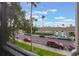 Parking lot with palm trees at 8168 Boat Hook Loop # 201/718, Windermere, FL 34786