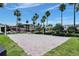 Sand volleyball court with net in a well-maintained community setting, perfect for outdoor recreation at 8168 Boat Hook Loop # 201/718, Windermere, FL 34786