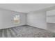 Bright bedroom with plush carpet and window at 865 Citrus Reserve Blvd, Davenport, FL 33837