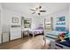 Bright bedroom with ceiling fan and two twin beds; perfect for a ' room at 930 Chickadee Dr, Port Orange, FL 32127