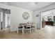 Cozy dining room with tile flooring and access to the living areas at 930 Chickadee Dr, Port Orange, FL 32127