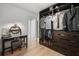 Organized walk-in closet featuring custom shelving and storage solutions at 930 Chickadee Dr, Port Orange, FL 32127