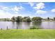 A scenic view of the water with surrounding homes creates a relaxing and picturesque environment at 930 Chickadee Dr, Port Orange, FL 32127