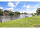 A scenic view of the water with surrounding homes showcases a relaxing and picturesque environment at 930 Chickadee Dr, Port Orange, FL 32127