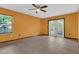 Spacious bedroom featuring neutral paint, tile floors, and a window for natural light at 9319 Woodbreeze Blvd, Windermere, FL 34786