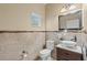 Stylish powder room featuring modern fixtures, elegant tiling, and a unique vessel sink at 934 Rock Harbor Ave, Orlando, FL 32828