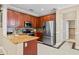 Well-equipped kitchen featuring stainless steel appliances, granite countertops, and ample cabinet space at 934 Rock Harbor Ave, Orlando, FL 32828