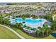 Community amenities include a pool with lounge chairs and umbrellas, walking trails, and recreational facilities at 9844 Beach Port Dr, Winter Garden, FL 34787
