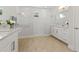 Bright bathroom features marble countertop double sinks, and a spacious walk-in shower at 9844 Beach Port Dr, Winter Garden, FL 34787