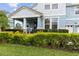 Charming front porch with seating and a delightful view at 9844 Beach Port Dr, Winter Garden, FL 34787