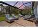 Relaxing outdoor lounge area with comfortable seating and peaceful views at 9844 Beach Port Dr, Winter Garden, FL 34787