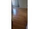 Bedroom with polished wood floors and a window at 101 Grand Plaza Dr # P40, Orange City, FL 32763