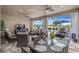 Beautiful lanai with plush seating and a view of the pool, perfect for lounging and dining at 1212 Zeek Ridge St, Clermont, FL 34715