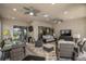 Spacious lanai with a seating and dining area, ideal for entertaining or relaxing outdoors at 1212 Zeek Ridge St, Clermont, FL 34715