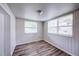 Bedroom offers natural light, new flooring, and ample space at 1335 E 3Rd Ave, Mount Dora, FL 32757