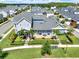 Stunning aerial view of the property, showcasing the backyard, patio, and surrounding neighborhood at 14366 Walcott Ave, Orlando, FL 32827